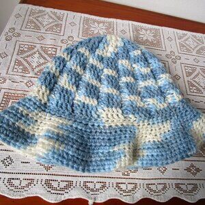 Large crochet knit bucket hat. Floppy rim, varigated blue and white pattern